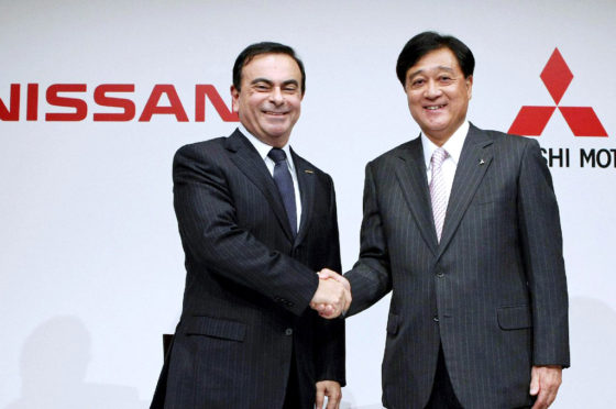 Carlos Ghosn y Osamu Masuko